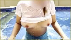 Play Amazing wife in wet t-shirt in the hotel pool | risky public exhibitionist